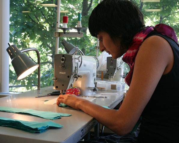 Fashion Design Student Working on Sewing Machine