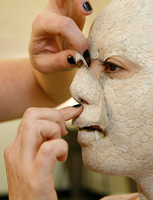 celine godeau applying makeup prosthetic