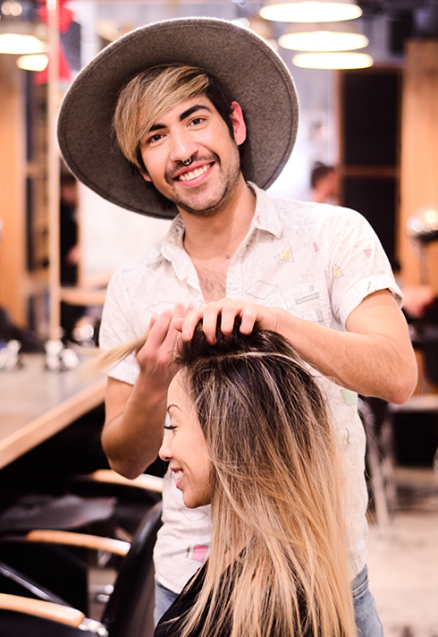 pro hair grad zachary jackson smiling