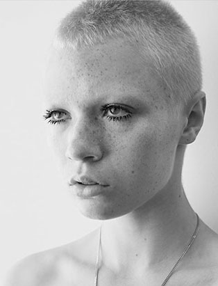 top makeup school graduate jon hennessy shaved head mascara