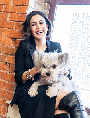 ana luisa laughing with dog in her hair studioana luisa valdez cutting hair at her studio in gastown pro hair school graduate blanche macdonald centre vancouver bc canada