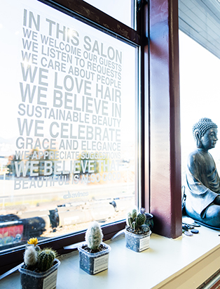 inspirational words on window at fowstate salon gastown pro hair school ana luisa valdes