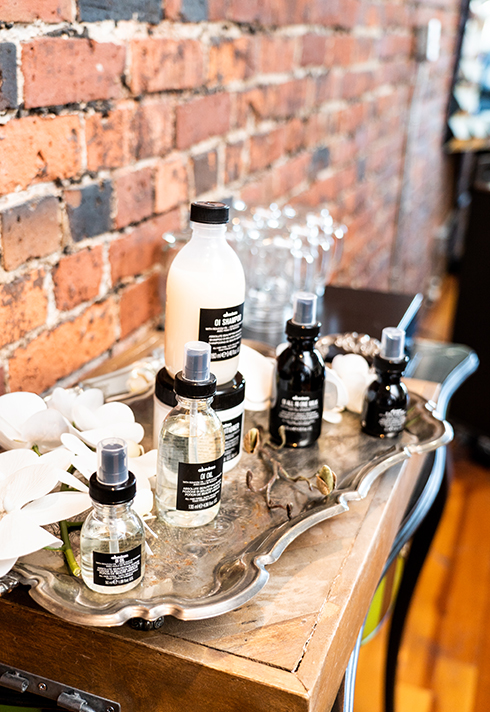 pro hair school ana luisa valdes tray of davines products at flowstate salon