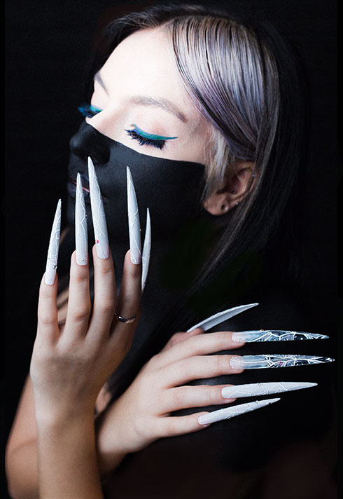 top beauty school graduate paige roy long icey nails