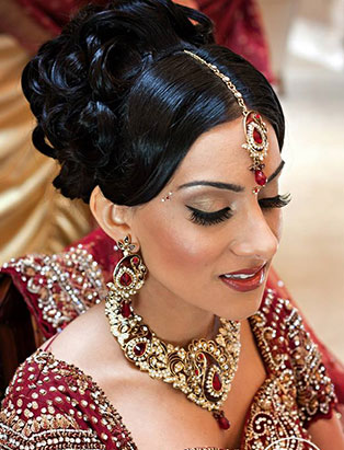 sharon rai bridal makeup red sari pinned curls