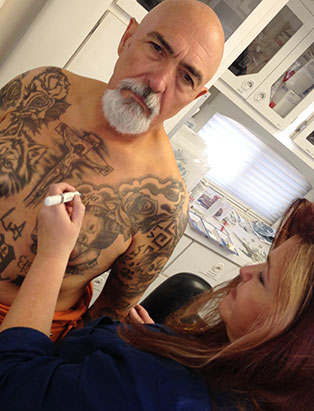 pepper gallegos applying makeup tattoos