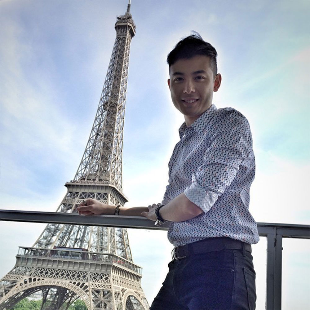 fashion marketing graduate brian chan at the eiffel tower