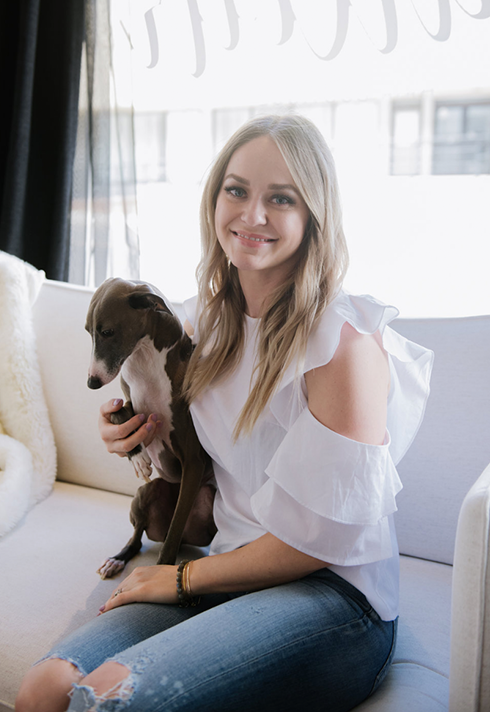 pro hair graduate tyla malcolm with dog