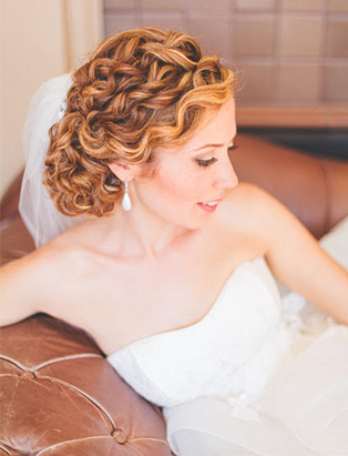 bridal undo curly pinned smiling