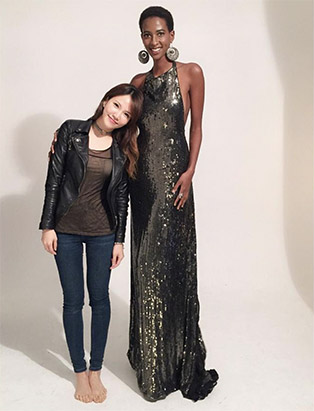 bmc graduate mua sunny lee standing with tall model