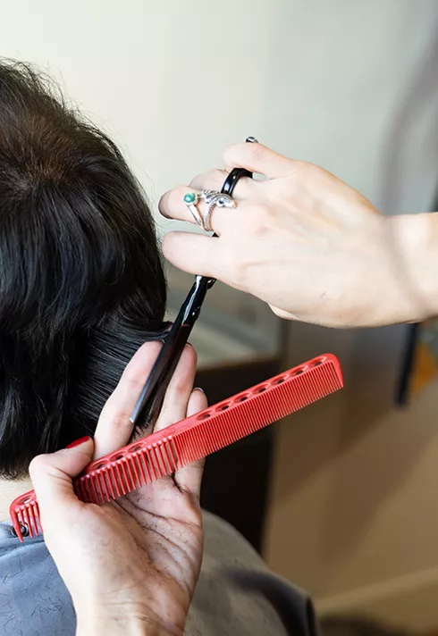 ana luisa valdez cutting hair at her studio in gastown pro hair school graduate blanche macdonald centre vancouver bc canada