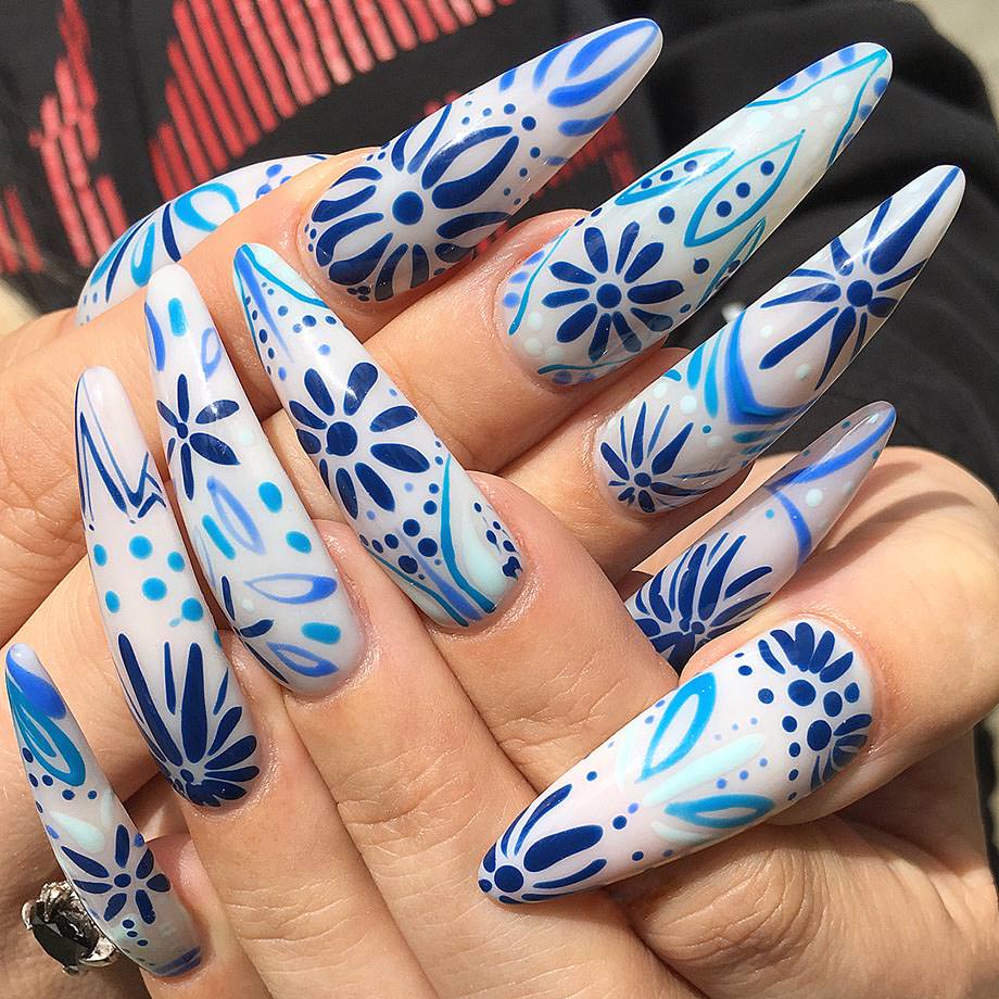 Blanche Macdonald instructor and nail artist Alejandra Ramazzi's blue and white nail creation