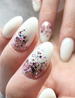 short white confetti nails by Blanche Macdonald Nail Studio graduate Alejandra Ramazzini