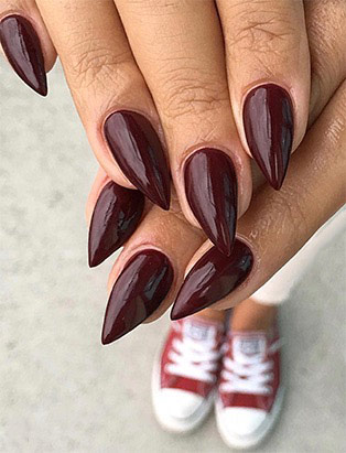 maroon pointed nails by Blanche Macdonald Nail Studio graduate Alejandra Ramazzini