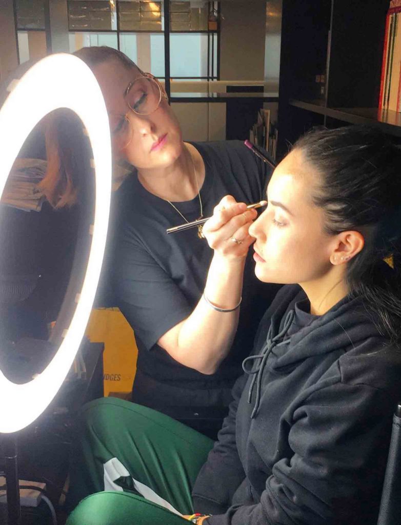 Blanche Macdonald makeup school graduate Lori Woodhouse applying eyeshadow