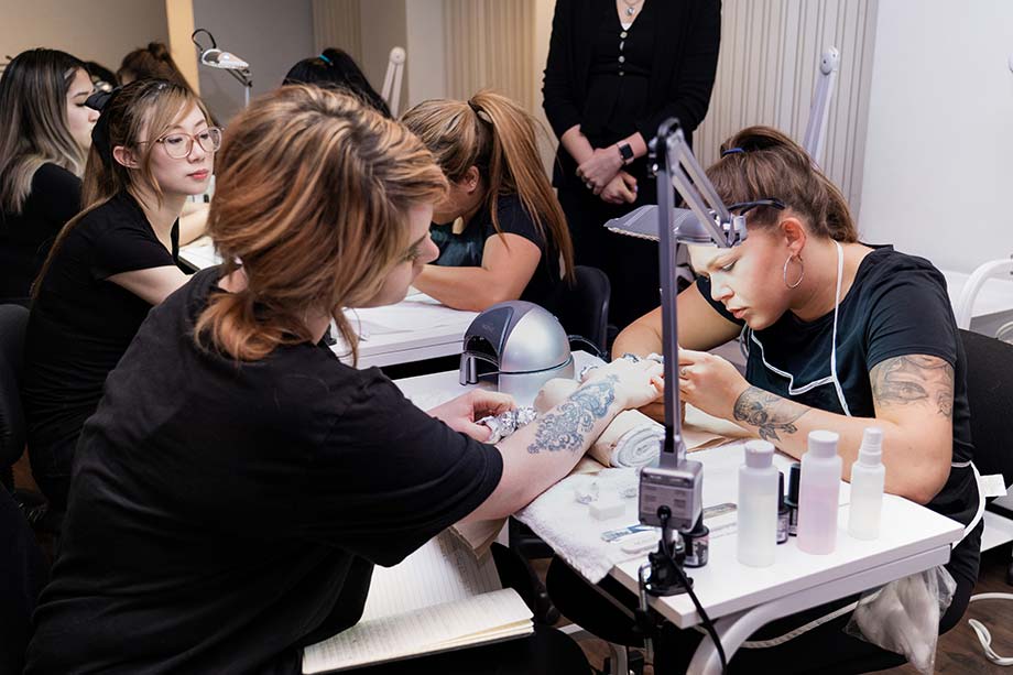 vancouver nail school students practice gel nail application