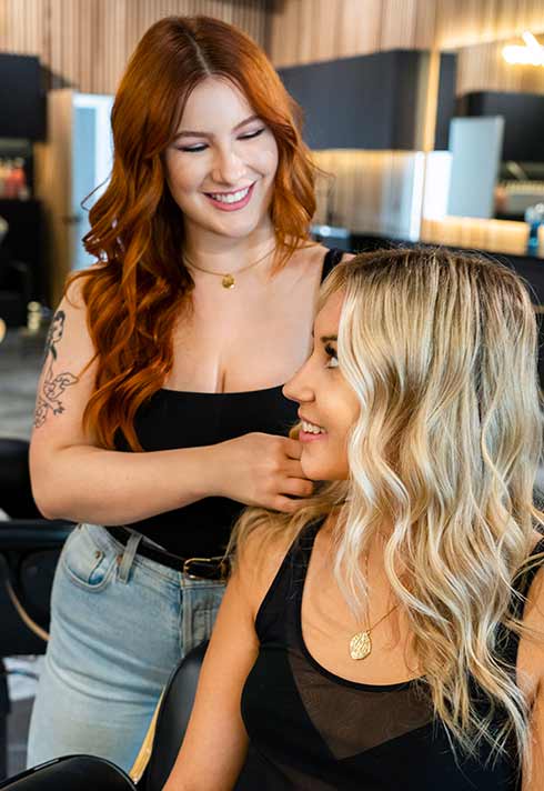 BLUSH Salon hair stylist Lara Dillman chatting with a client