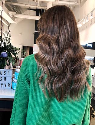 brown wavy long hair by Lara Dillman senior stylist at BLUSH Salon Vancouver and BMC graduate