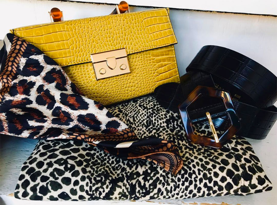 still life of fashion accessories with animal print