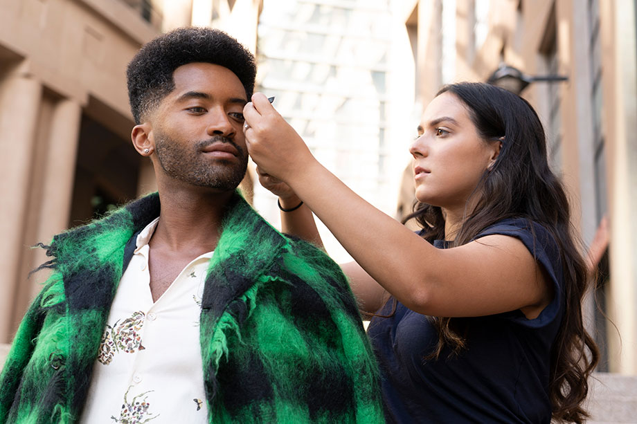 Sandra Perovic touching up mens grooming on photoshoot