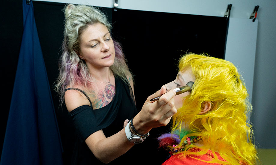 BMC pro makeup graduate Jana Bizzari applying makeup at an editorial shoot