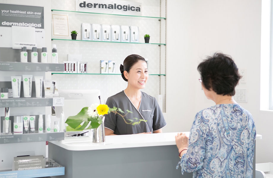 Tomoko Tajima greets a client in her spa reception