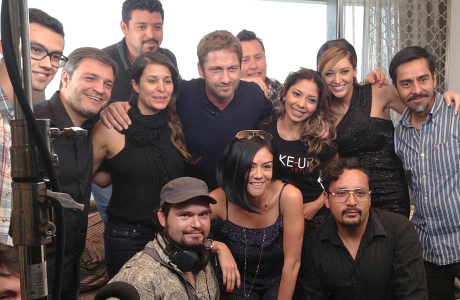 Blanche Macdonald graduate Alejandra Hernandez with Gerard Butler and her film team