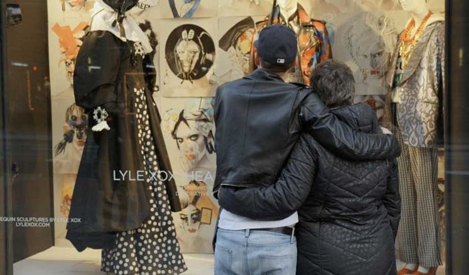 Lyle Reimer and his mom in front of one of two Bergdorf Goodman windows in New York City featuring LyleXOX