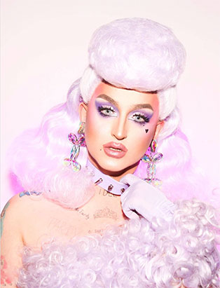 cool pink powder puff hairstyle on Ilona Verley