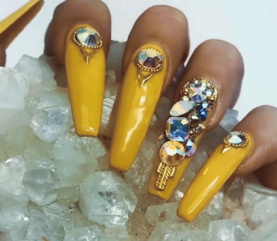 Tatiana Tavares 90s yellow bejeweled nails