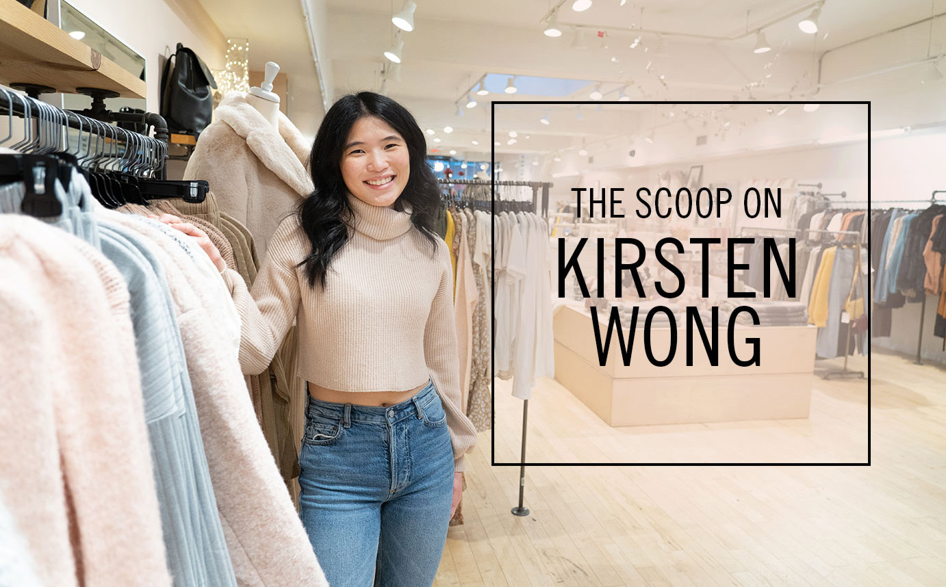 Blanche grad Kirsten Wong standing in store