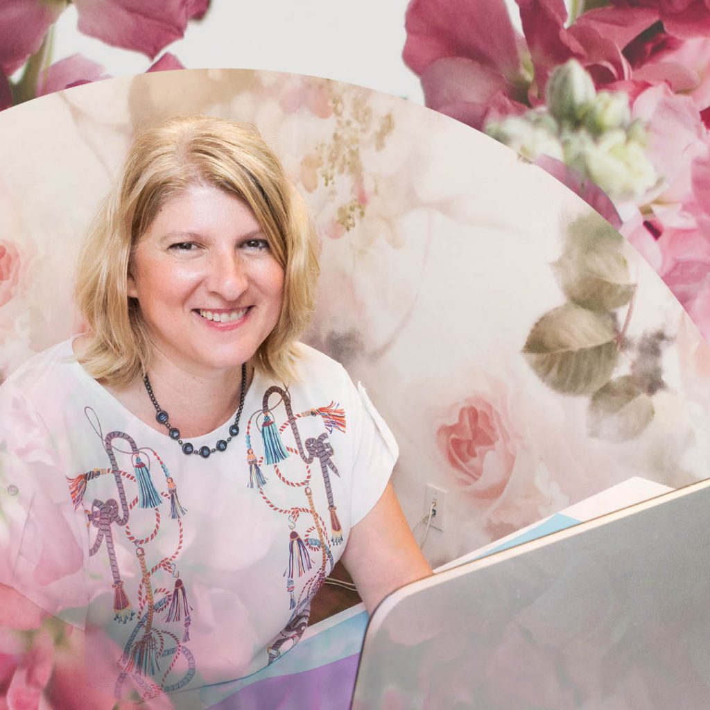 Esthetics Director Simona Gozner at her desk at Blanche Macdonald's esthetics school