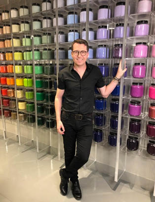 David Penrice at MAC store in New York with various MAC pots