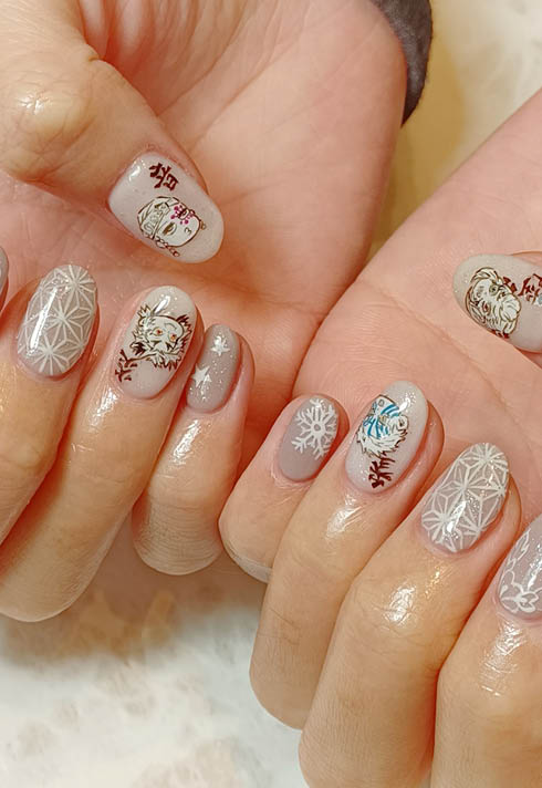 Short Rounded Nails with nude base and anime nail art