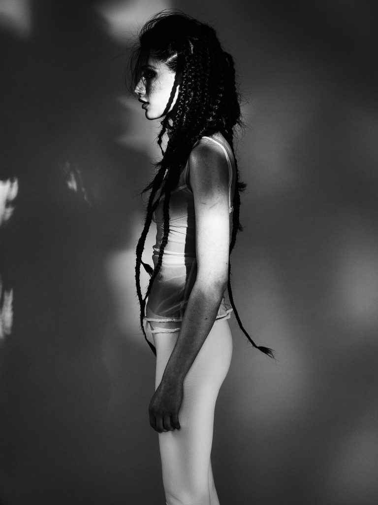 Black and white image, model standing, work by Blanche Macdonald Graduate Melfinna Tjugito