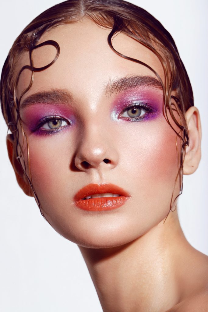 close up shot of model, wet hair look, pink eye makeup, dewy skin, Indonesia, Melfinna Tjugito