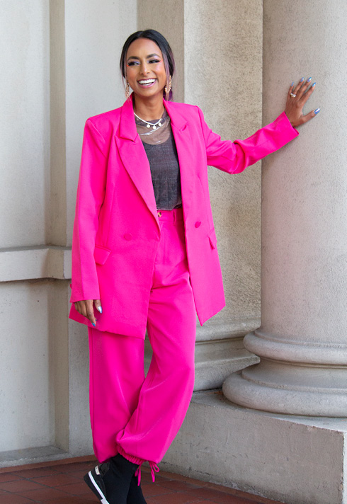 Makeup Artist, Shaina Azad in full set of neon bright pink suits