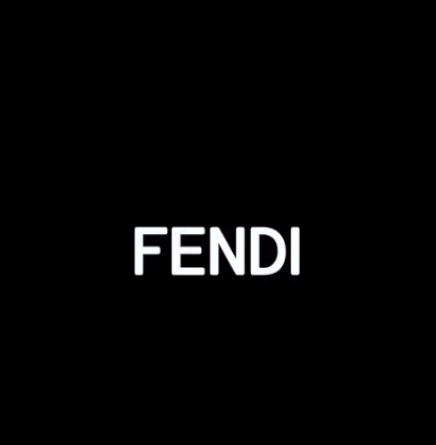 Fendi SS 23 Fashion show in Paris Fashion week, with nylon green, and nylon purple purses.