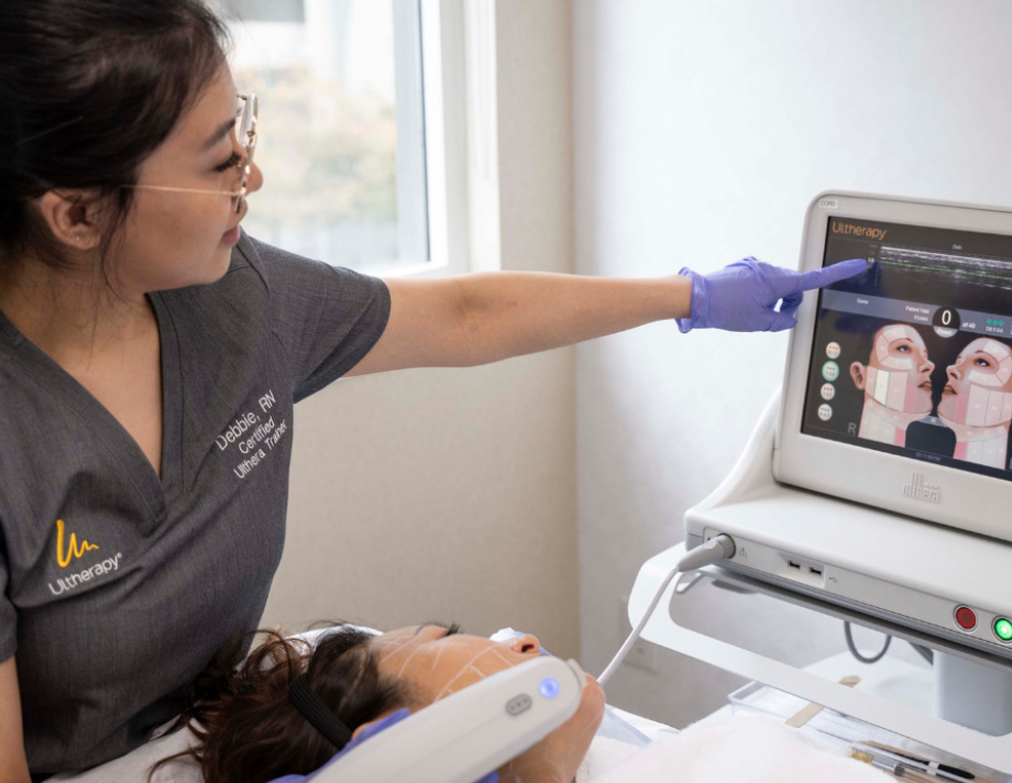 Vancouver Laser and Skin Care Centre Registered Nurse, Debbie doing facial with a client.