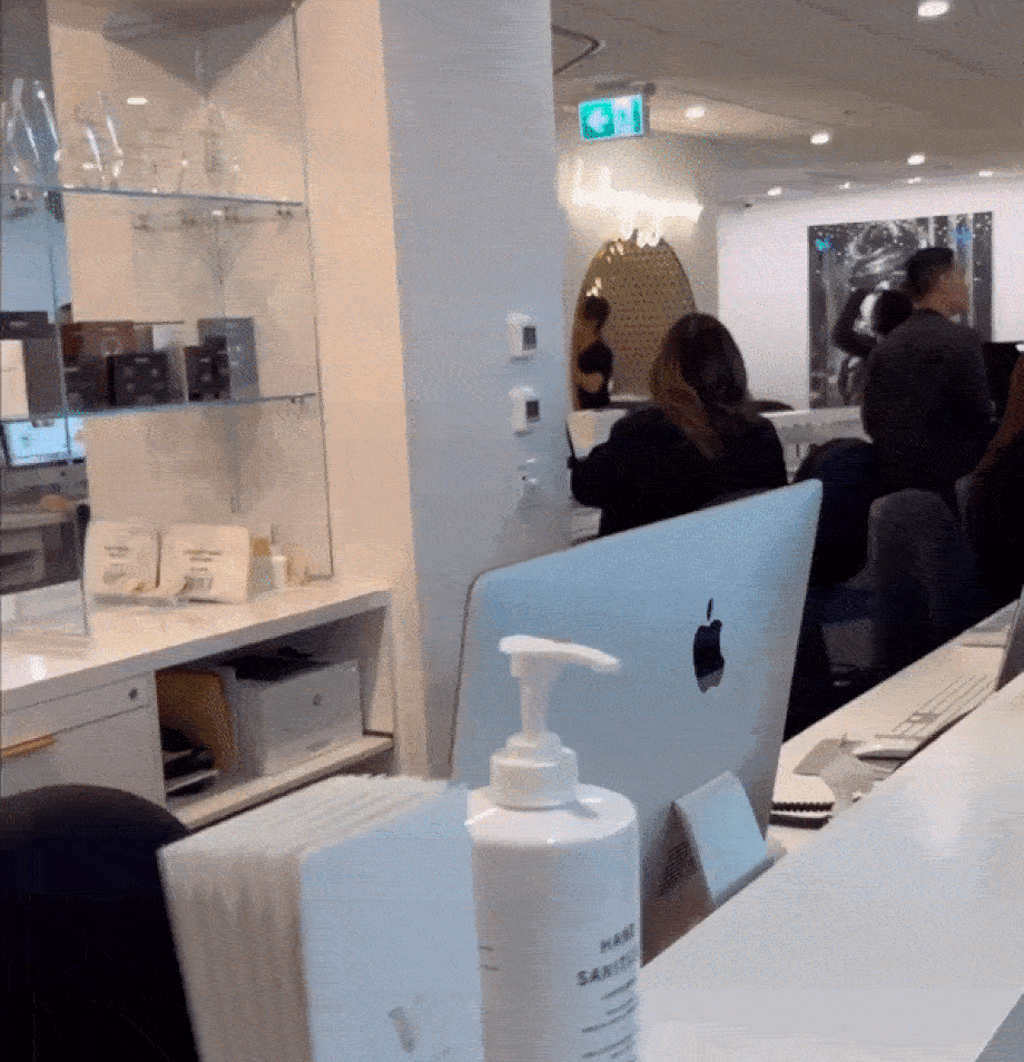 A gif of the reception area of Vancouver Laser and Skin Care Centre, full of Blanche Macdonald Centre Global Esthetics students and instructors.