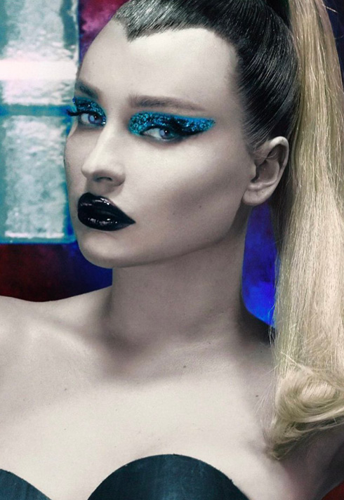 Kim Petras wearing black glossy lip, with blue shimmer eye makeup created by Jenna Kuchera, First Assistant for Pat McGrath.  