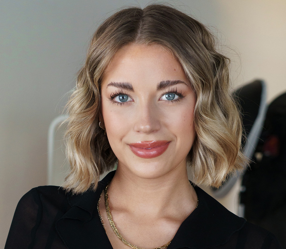 Profile picture of Fashion Buyer, Kimberly Schmalz in natural makeup, bob short hair.