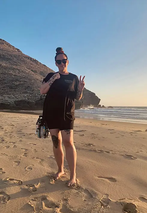Kara Alaric posting at the beach