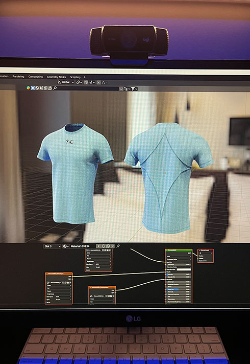 3D model of a blue top garment on a monitor
