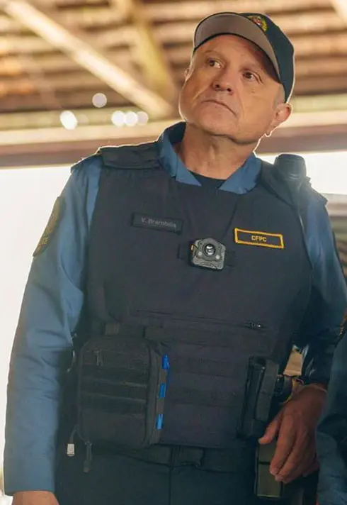 Actor Enrico Corlantoni in police costume on the set of Allegiance