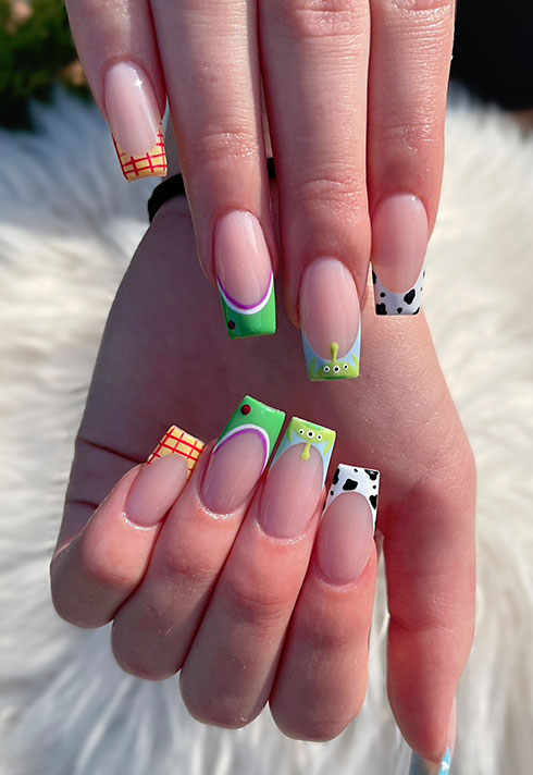 toy story theme nail design with long coffin shape created by nail tech Hailey Bornais