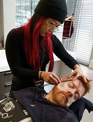 “My chair is full of secrets.” Meet Barber School Instructor Holly Hui