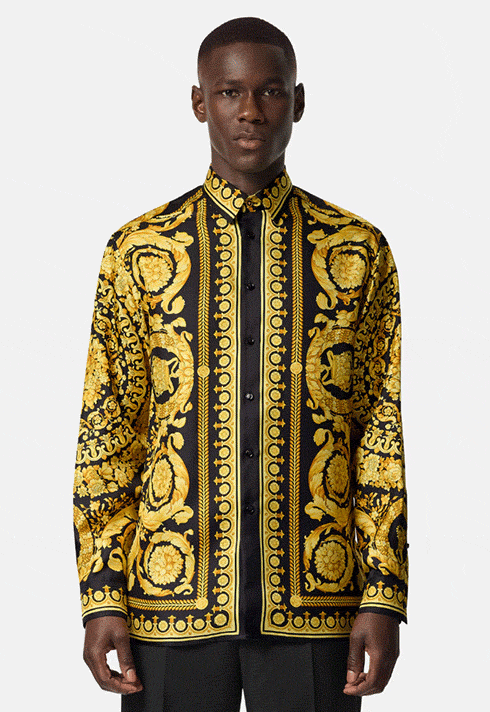 A Versace Men's classic yellow and black barocco silk shirt wore by a Black male model