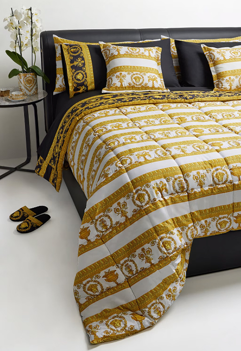 Versace Home Collection with i ♡ baroque double-face comforter on a black bed