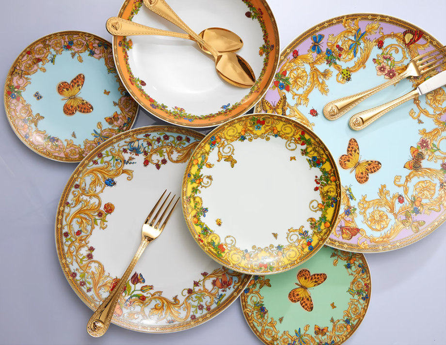 Le Jardin de Versace Dinner Plate Collection, with blossoms, berries, insects prints, and a Greca frame.